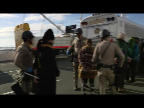 Pro-Palestine demonstrators chant against Joe Biden