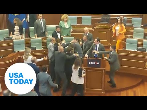 Lawmakers throw down on parliament floor | USA TODAY