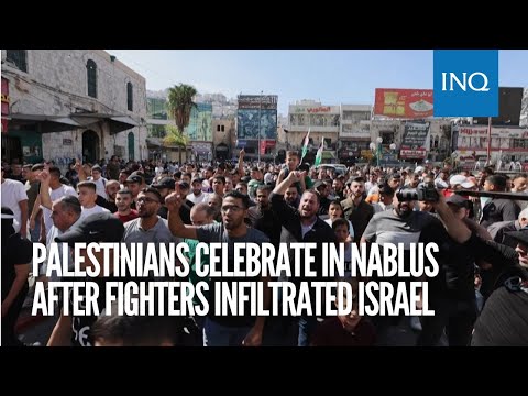 Palestinians celebrate in Nablus after fighters infiltrated Israel