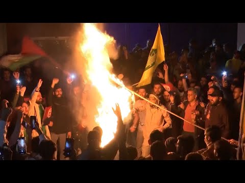 Protesters in Iran burn Israeli flags after Gaza hospital blast