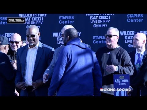 RIDDICK BOWE CONFRONTS LENNOX LEWIS AFTER THEY EXCHANGE WORDS AT HEAVYWEIGHT LEGENDS EVENT