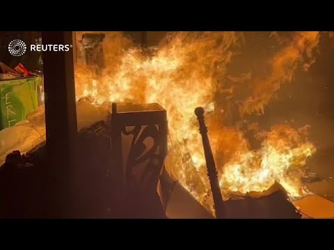 France: Protesters set garbage fires in Paris as government survives no-confidence vote