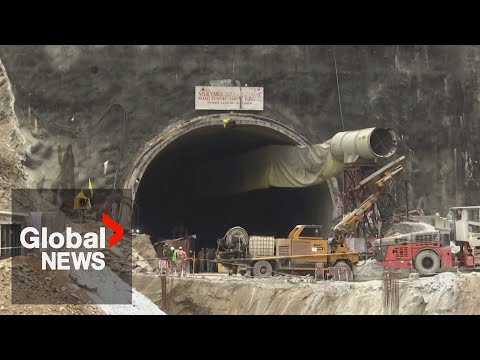 India tunnel collapse: Rescuers resort to manual digging to free workers after machinery breaks