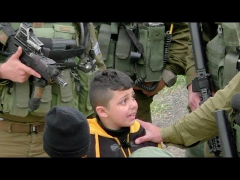 Israeli soldiers drag 8-year-old from home to home looking for stone-throwers, Hebron, March 2017