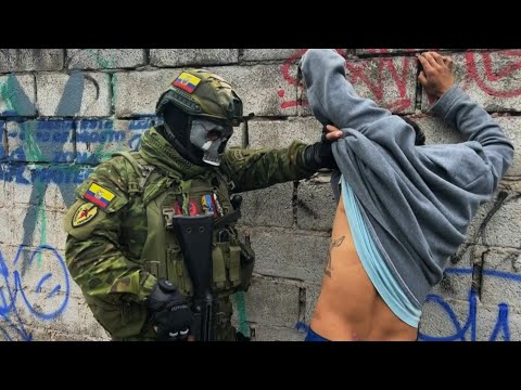 Ecuador: Soldiers frisk man amid search operation over gang violence | AFP