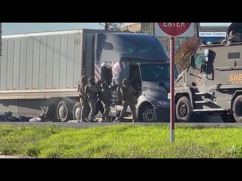 SWAT team pulls driver out of big rig after chase, hours-long standoff on East Freeway