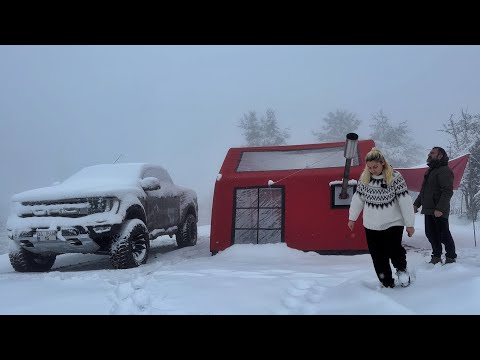 HOT TENT CAMP WITH STOVE IN RAIN AND SNOW