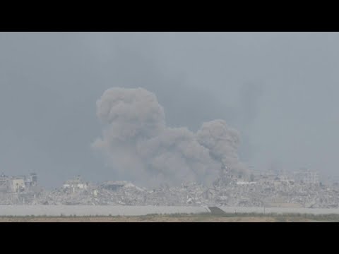 Huge cloud of smoke following a strike in northern Gaza, seen from Israel | AFP