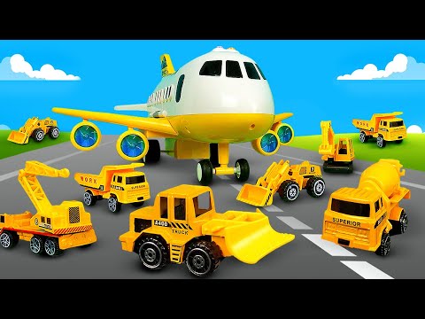 Vid&eacute;o en fran&ccedil;ais avec voitures pour enfant. Avion-transporteur de v&eacute;hicules d'assistance.