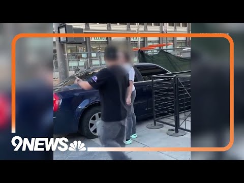 Driver squeezes car through fenced sidewalk, takes off with flat tires