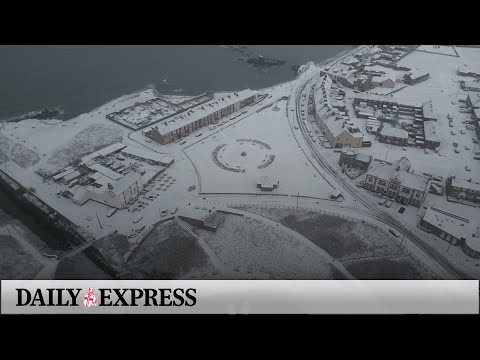 Thousands without electricity in Cumbria as people rescued from snowbound cars