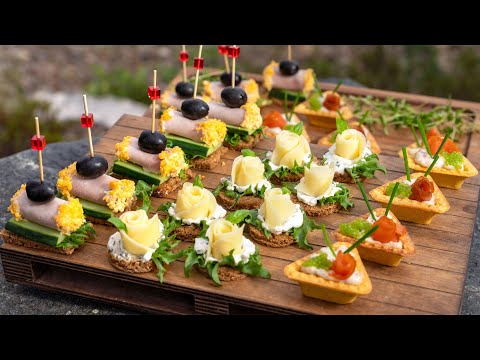 Finger food ideas for party. Triangular stuffed with paste, mini rolls, cheese roses