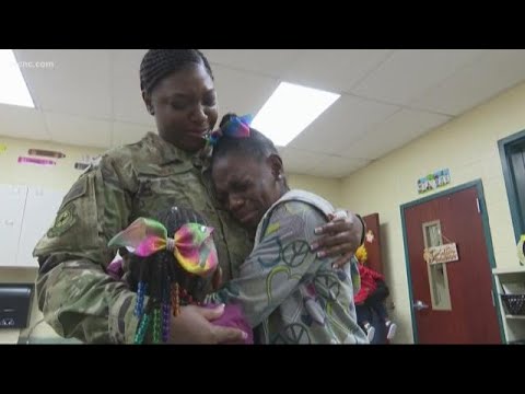 Military mom surprises daughters at school