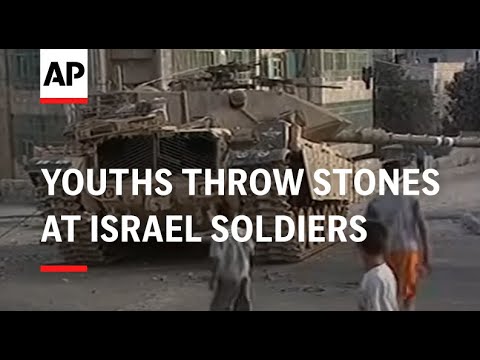 Youths throw stones at Israel soldiers