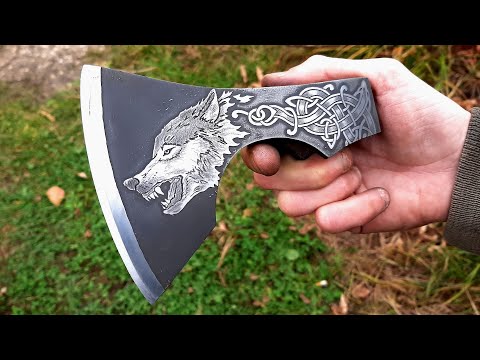 Drawing on metal. Steel wolf. Made from a rusty axe