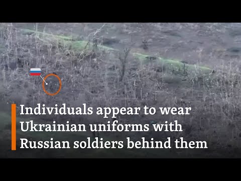 Drone Footage Appears To Show Russian Soldiers Using Ukrainian POWs As Human Shields