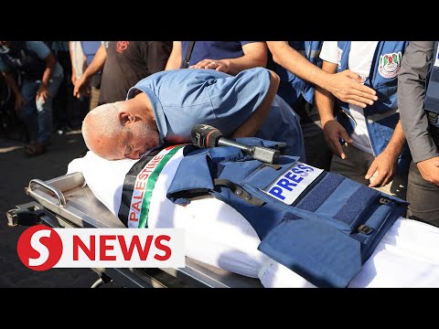 'Stop killing journalists' Gazans mourn Palestine TV reporter