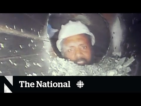 First video of workers trapped in India tunnel