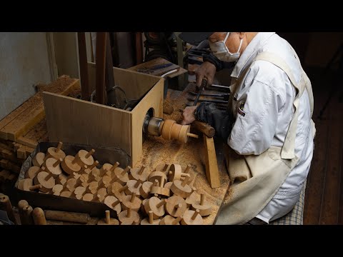 The process of making a Japanese spinning top. Traditional toy handed down from 1,300 years ago.