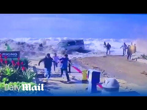 Moment huge waves batter the coast of California