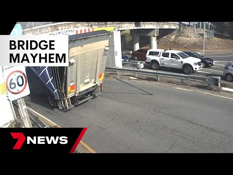 Queensland Rail plead motorists to take care when driving under low bridges | 7 News Australia