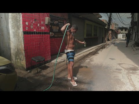 Rio favela residents endure heat wave without electricity | AFP