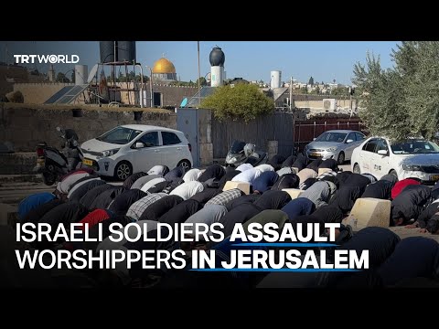 Worshippers pray on the street as Israel restricts access to Al Aqsa