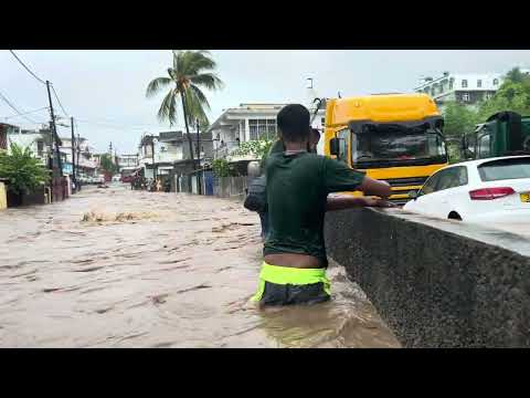 Walking Caro lalo river overflow into houses Mauritius rain cyclone Belal