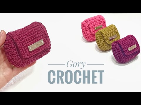 Crochet a small wallet for money from leftover threads