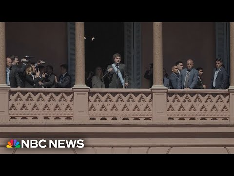 New Argentine President Javier Milei speaks to his supporters from the House of Government