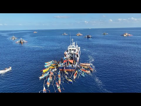 Filipino fishermen chased by China coast guard in disputed waters | AFP