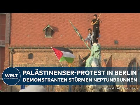 PROTESTE GEGEN ISRAEL: Chaotische Szenen! Anh&auml;nger der Pal&auml;stinenser st&uuml;rmen Neptunbrunnen in Berlin