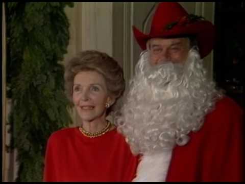 Nancy Reagan and Larry Hagman as Santa Claus for the White House Christmas Tour on December 9, 1985