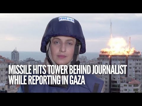 Missile hits tower behind journalist while reporting in Gaza