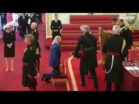 Bee Gees star Sir Barry Gibb reveals he struggled to get to his feet after being knighted | ITV News