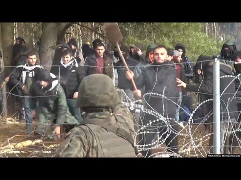 Heightened Tensions On Poland-Belarus Border As Migrants Attempt To Force Down Border Fence