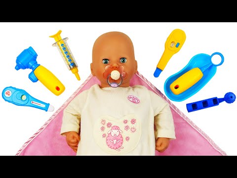 Baby Annabell doll is ill. Baby dolls' check-up in a hospital. Baby born doll feeding &amp; role play.