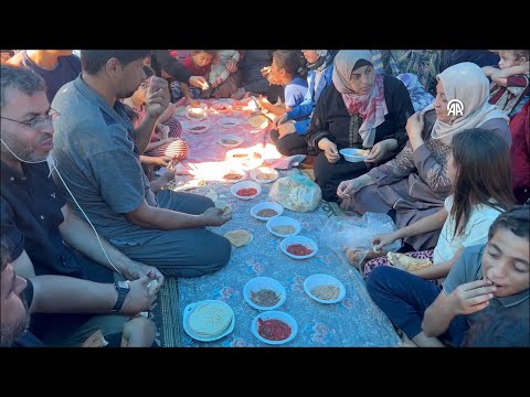 Palestinians who took refuge in Shifa Hospital are trying to continue their daily lives