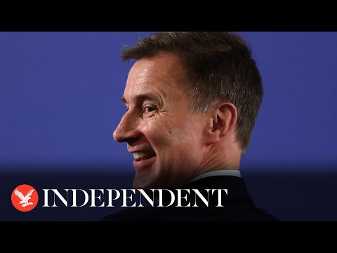 Jeremy Hunt heckled as he announces benefits will be stopped in autumn statement